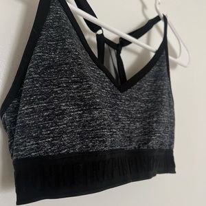 Black and grey ‘PINK’ racer back sports bra